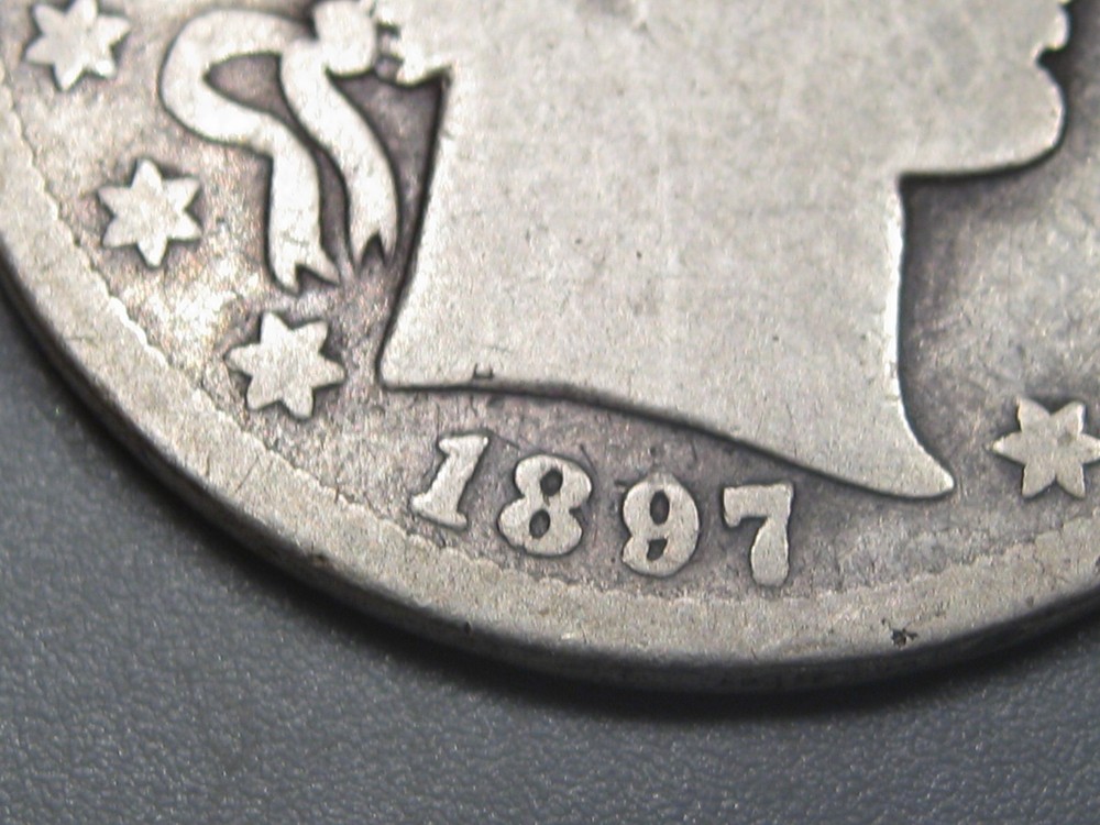 Better-date 1897-s Silver BARBER Half Dollar.