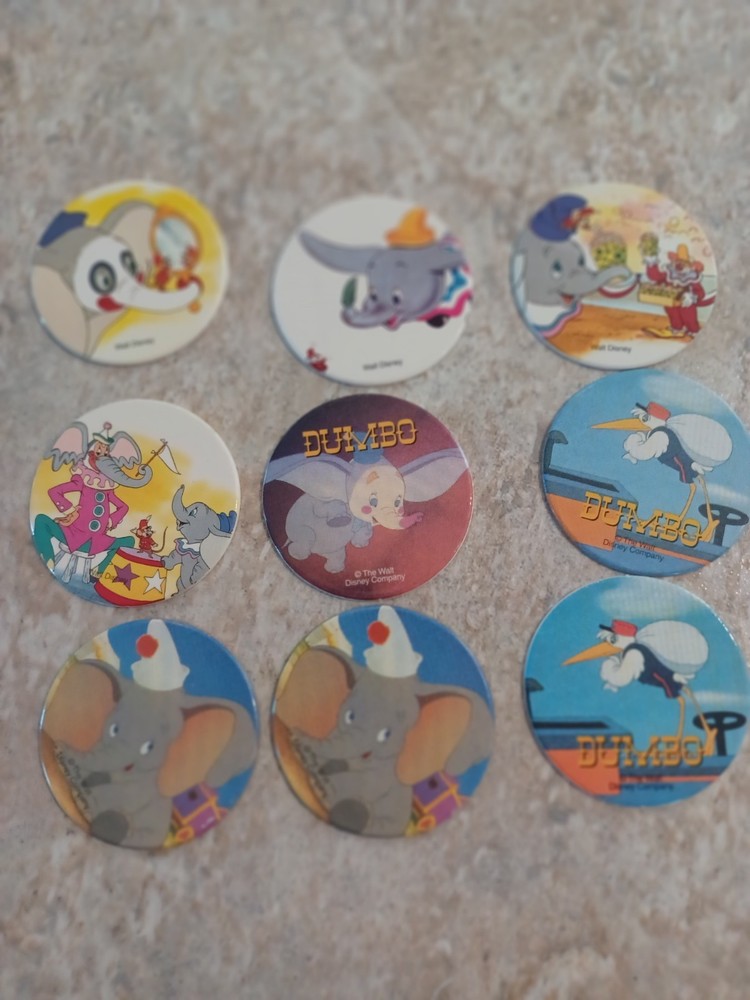 Disney Vintage Dumbo Pogs x 9