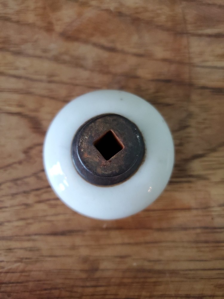 Two Antique Victorian White Porcelain Door Knobs With Iron Stem