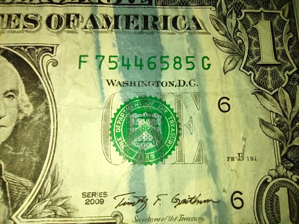 RARE INKING ERROR 2009 ONE DOLLAR FEDERAL RESERVE NOTE.