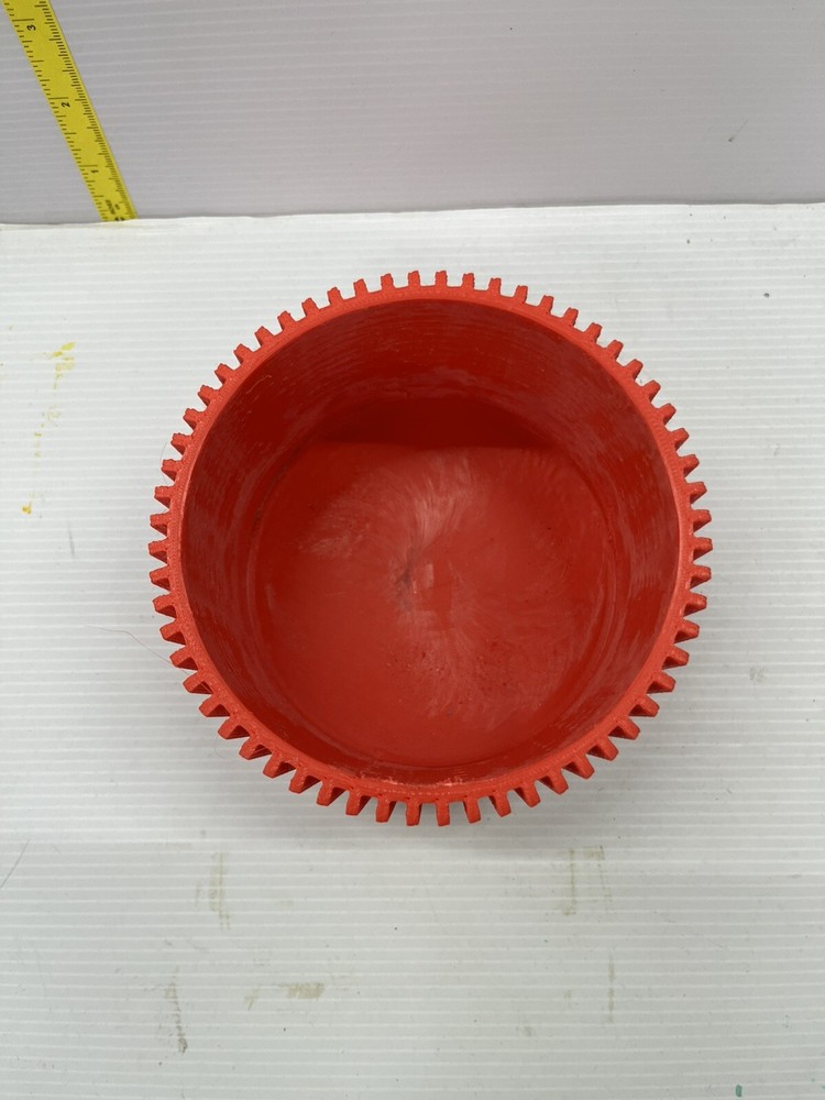 A planter designed for modern aesthetics and functionality RED