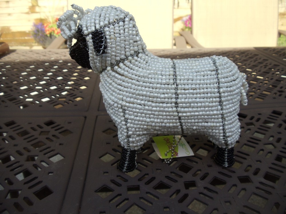 Beaded land: White sheep