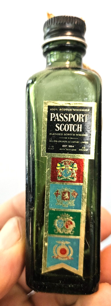 Passport Scotch empty 1/10th pint glass bottle stayed internationally buzzed