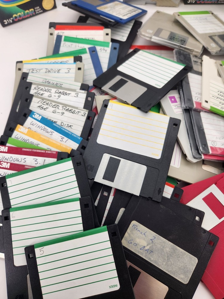 10 unsorted used 3.5" floppy disks various brands and systems.