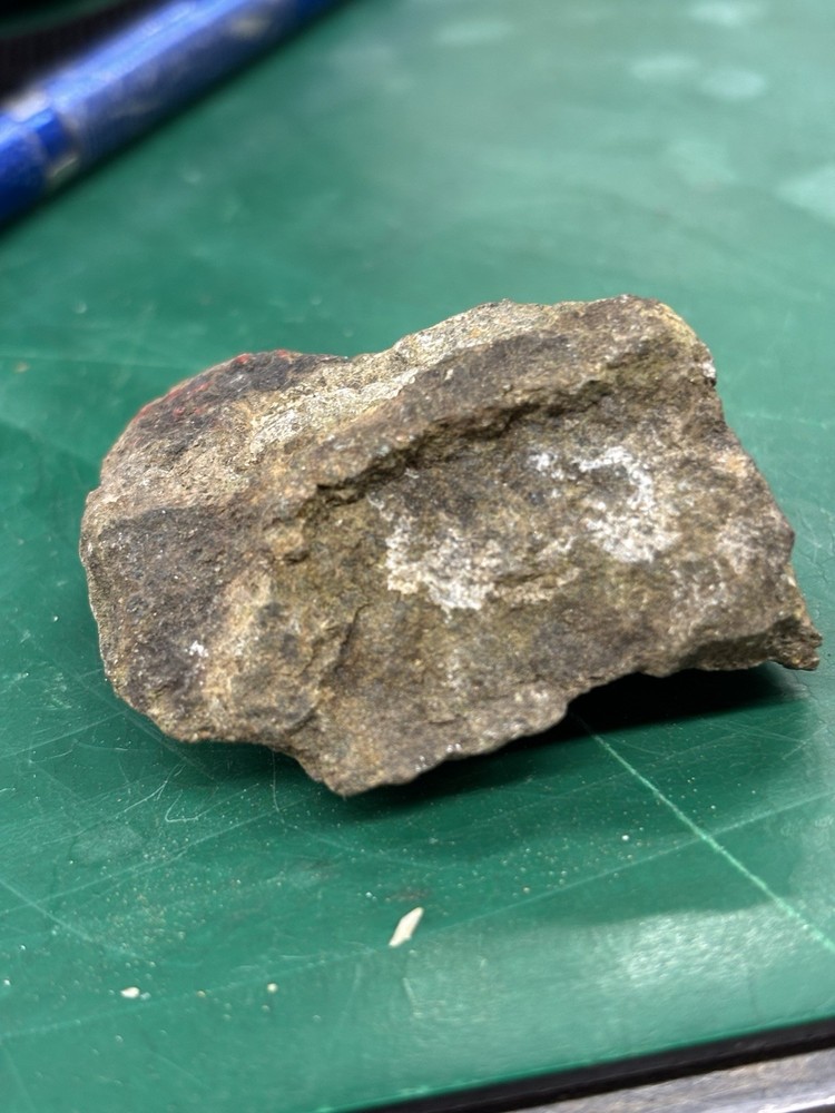 as gold ore on green stone