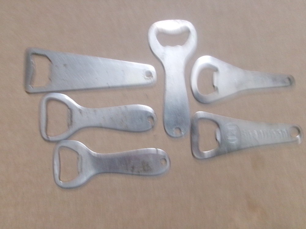 Six Different Hotel Metal Bottle Openers