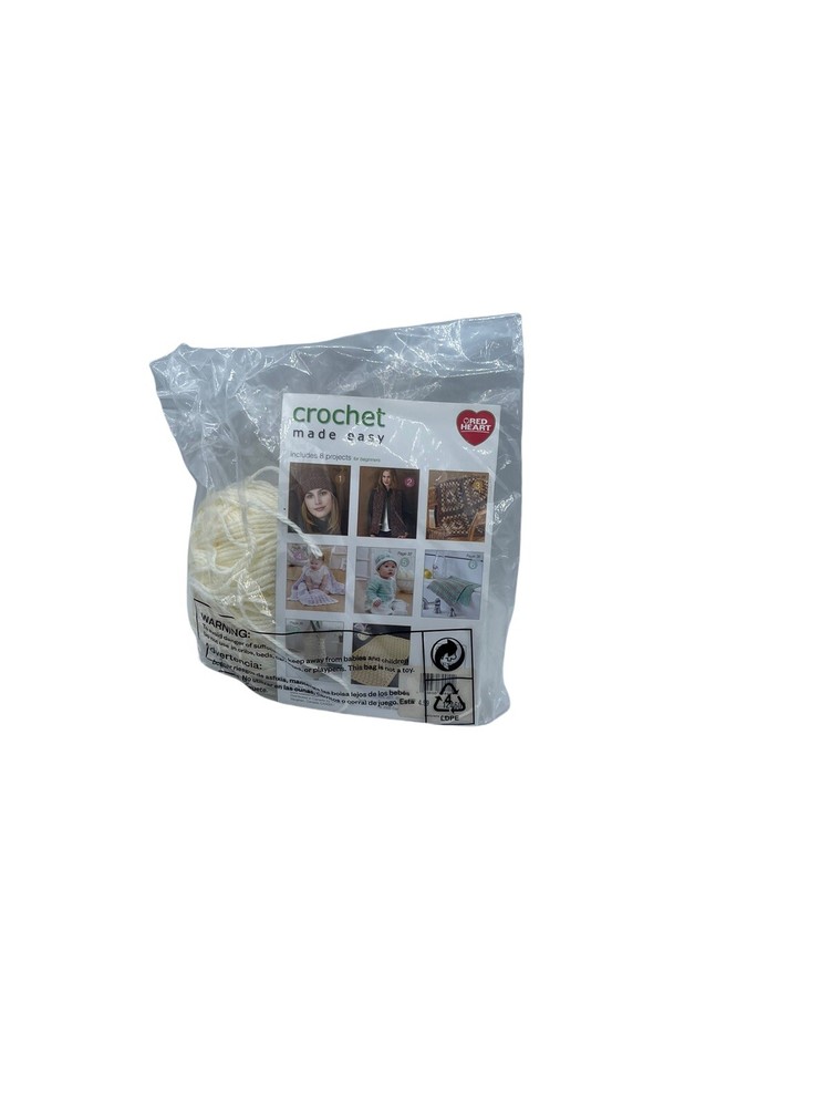 Crochet Made Easy Booklet With Cream Colored Yarn