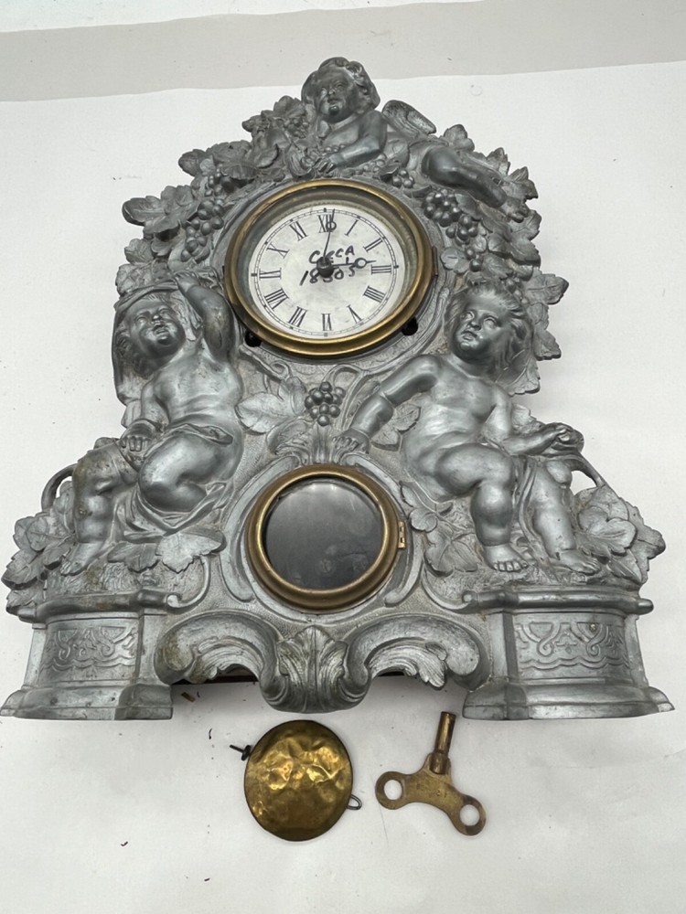1850's  The American Clock Co. Cast Clock.