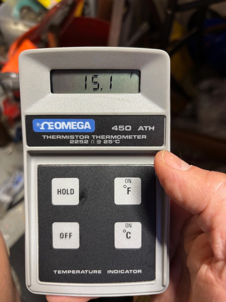Omega 450 Digital Thermometer Powers On.