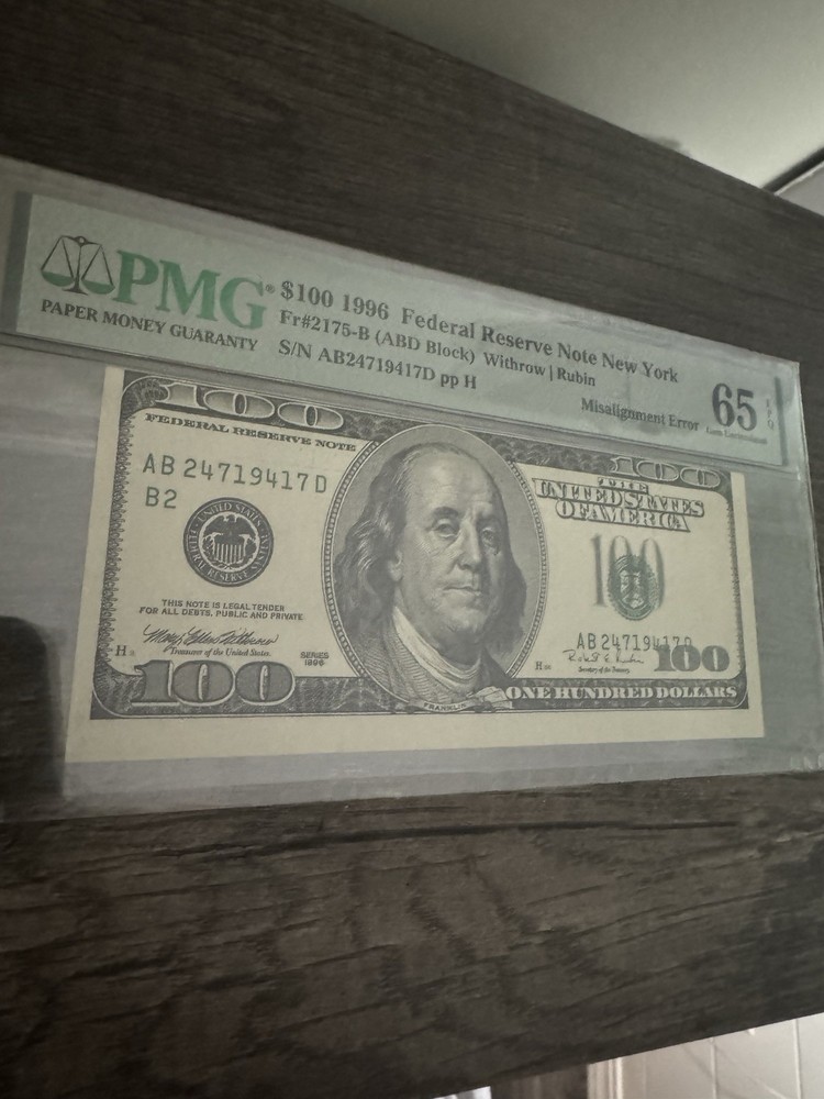1996 100$ “Mis-Alignment” P.M.G #65EPQ