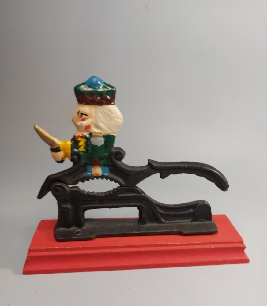 Cast Iron Painted Soldier Nut Cracker on wood base