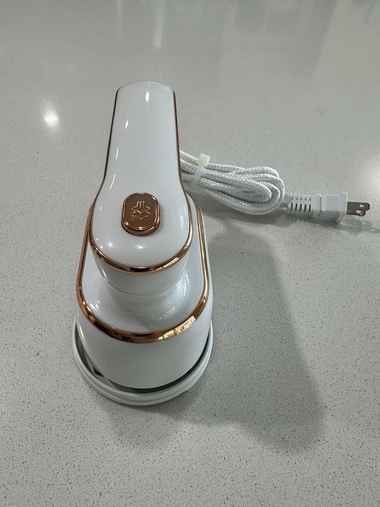 Handheld Steaming And Ironing Machine.