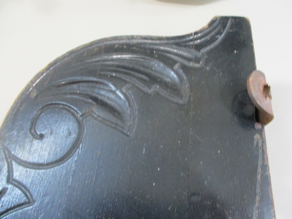 Antique painted black corbel.