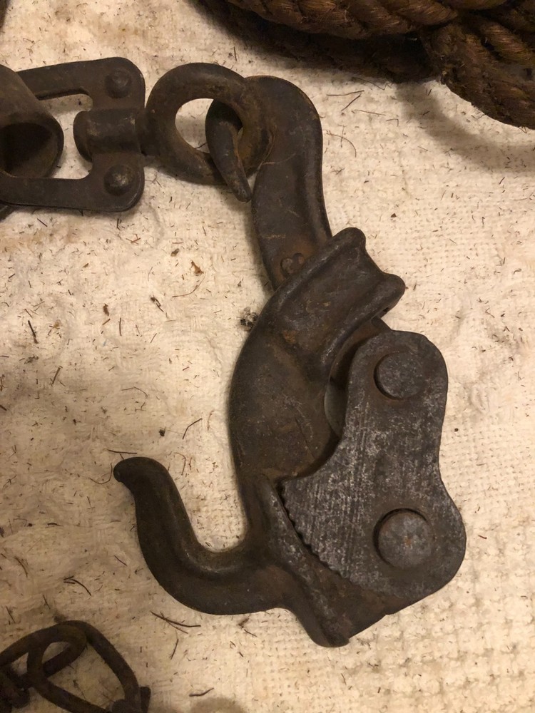 Antique primitive rope and chain hoist