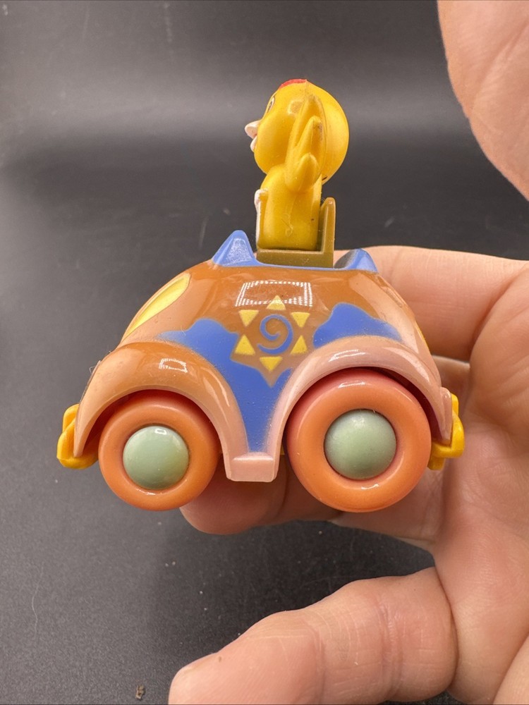 Chick Rides a Compact Car Pull Release Toy, 2.5” tall