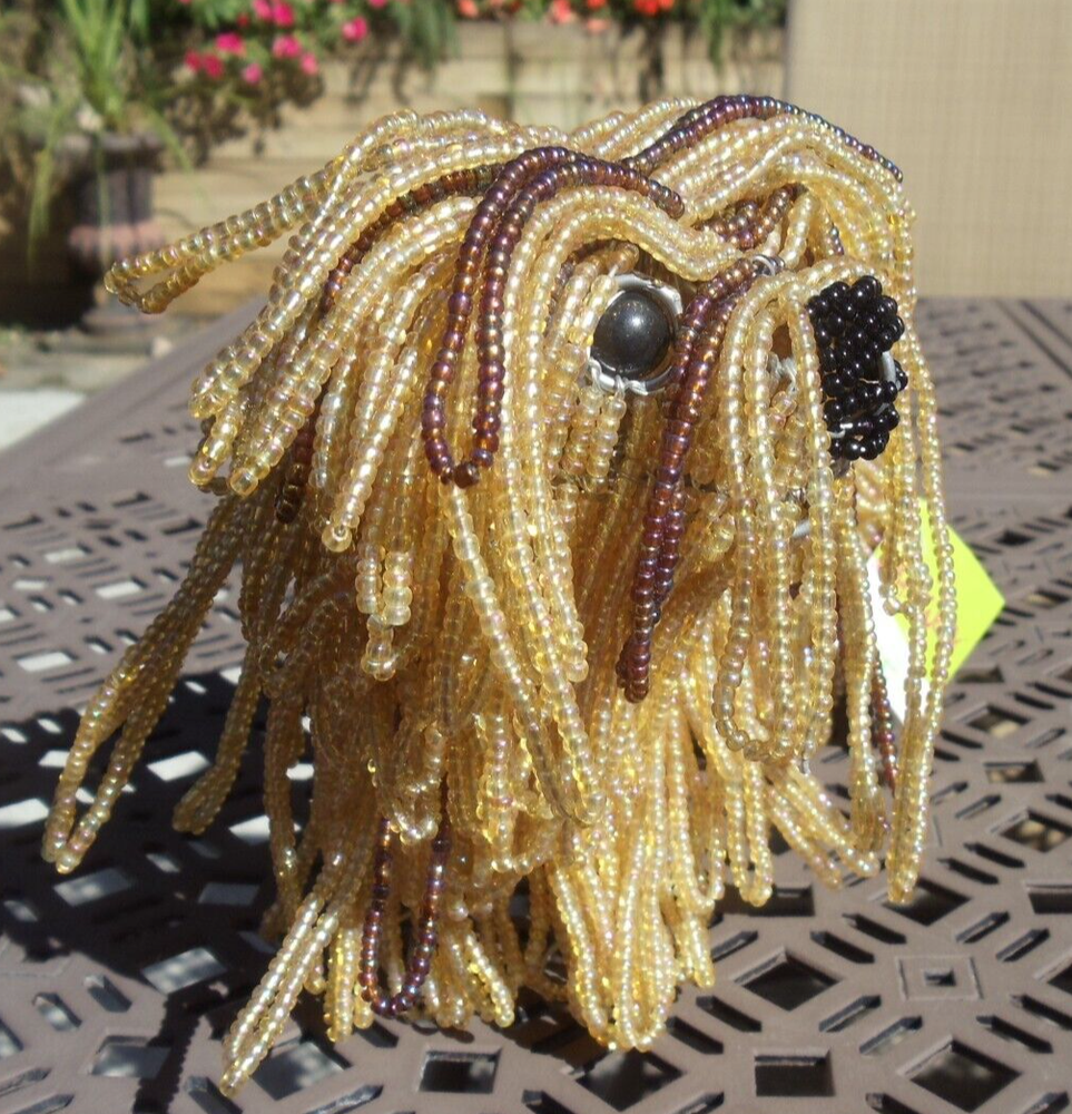 Beaded land: Tibetan Lhasa Apso