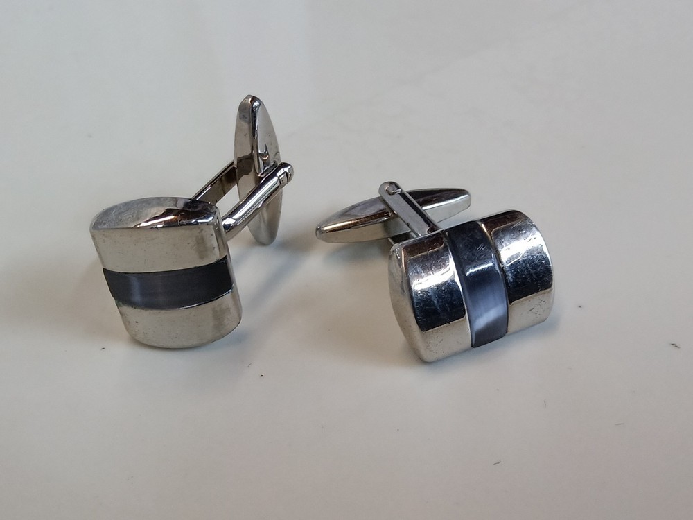 Silver colour cufflinks with embedded grey stone