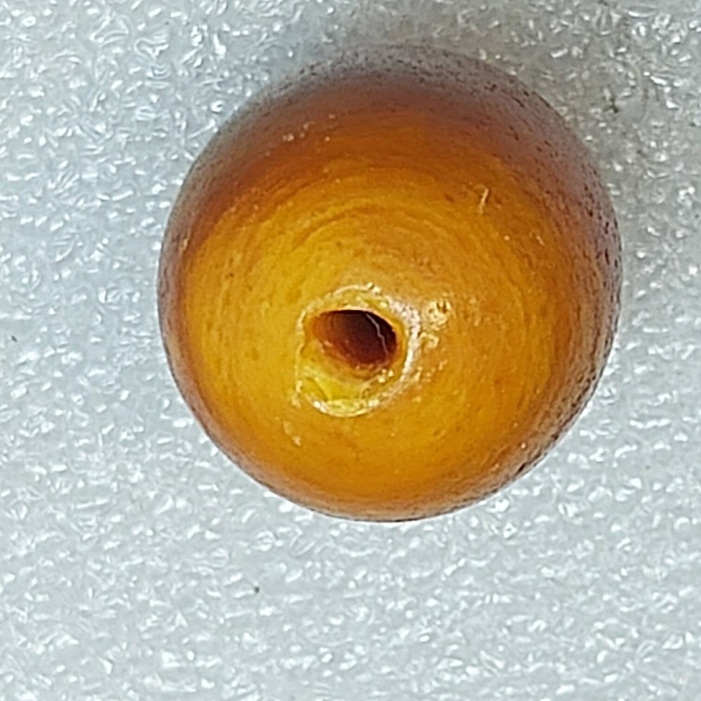 Ancient large amber cabochon bead
