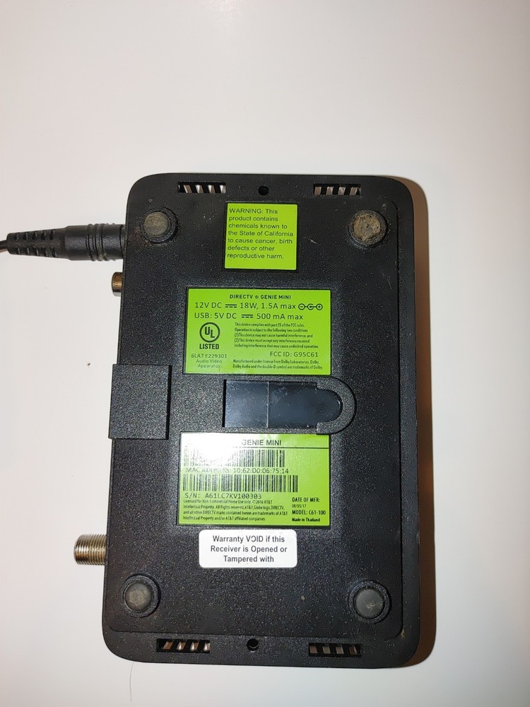 DIRECTV Genie Mini client receiver, model C61-100, with power adapter.