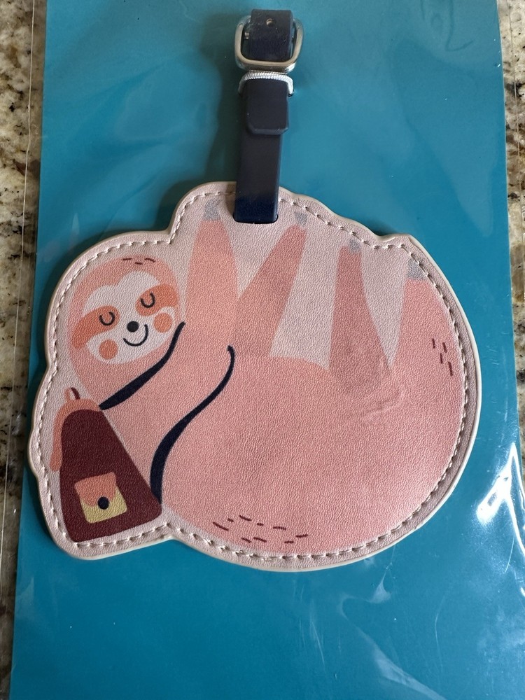 sloth-themed luggage tag
