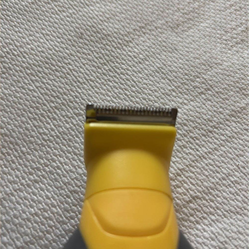 REMMINGTON CORDLESS RAZOR MODEL # UA 050035E