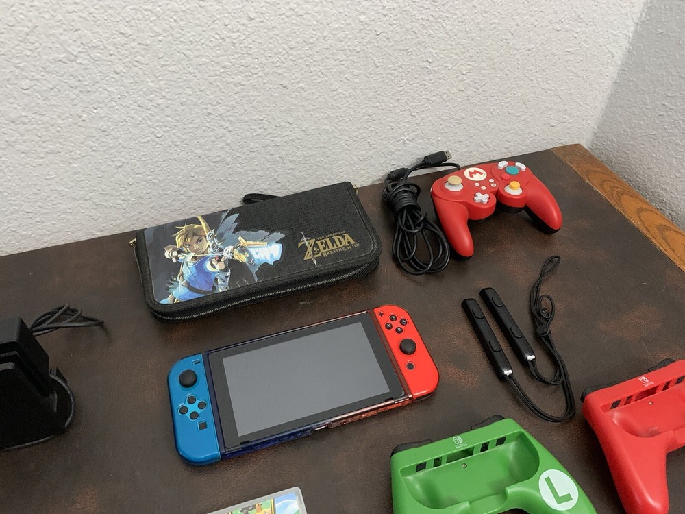 Nintendo Switch Console With A Bunch Of Stuff