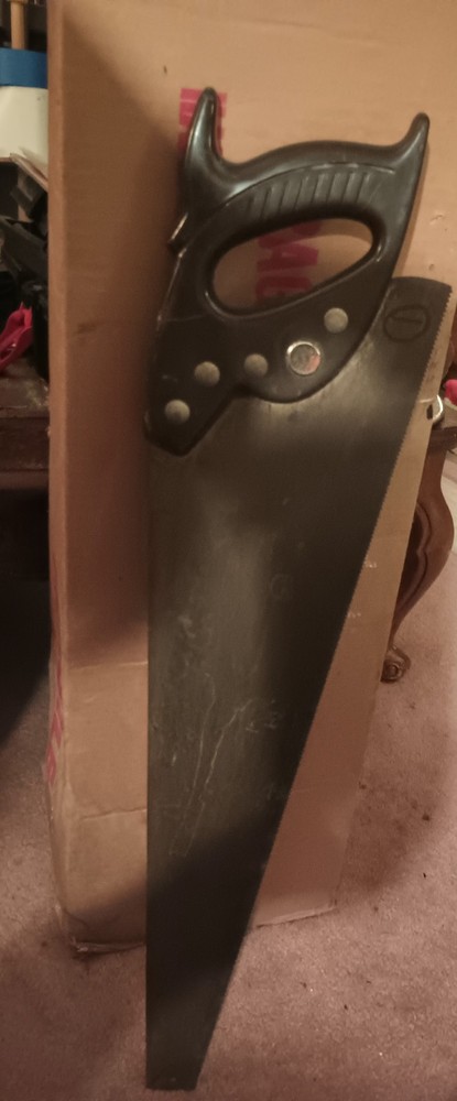 Dark Brown Handled Saw