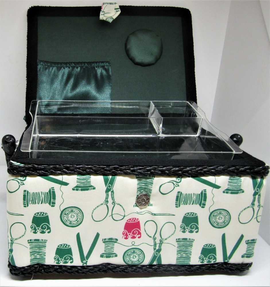 Sewing basket with handle and insert.