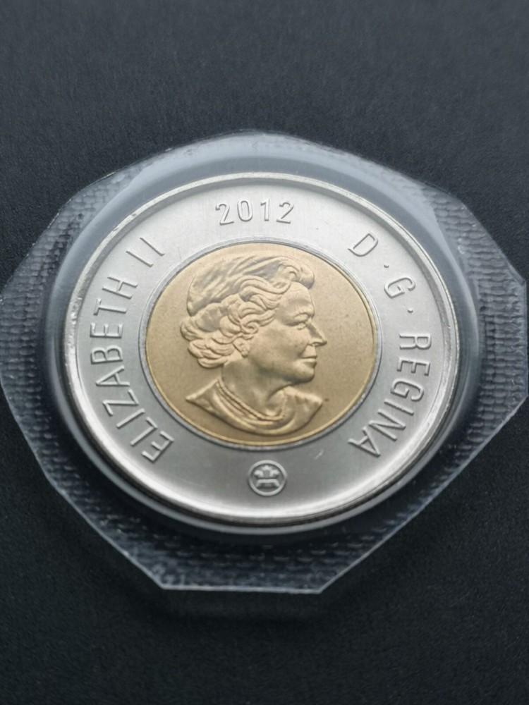 *** CANADA  TOONIE  2012 *** OLD  VERSION *** BETTER  DATE  *** GOOD  DEAL ***