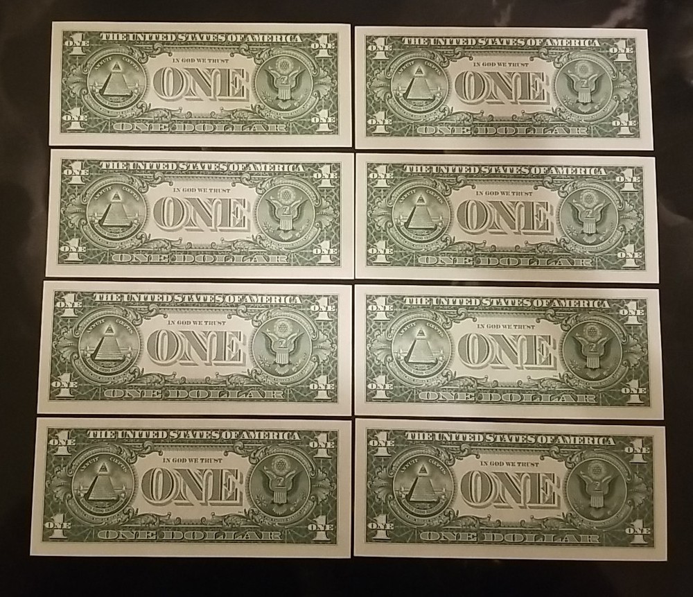 EIGHT $1 1957 A - CONSECUTIVE SERIAL #'S UNCIRCULATED SILVER CERTIFICATE NOTES.
