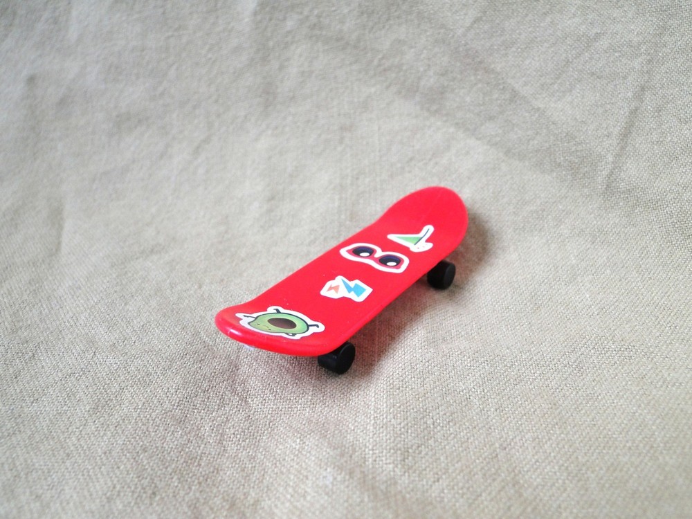 Mini Red Plastic Skateboard