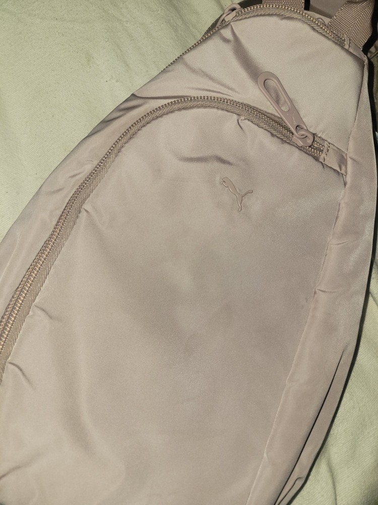 PUMA Myriad Sling Backpack. Mauve Color