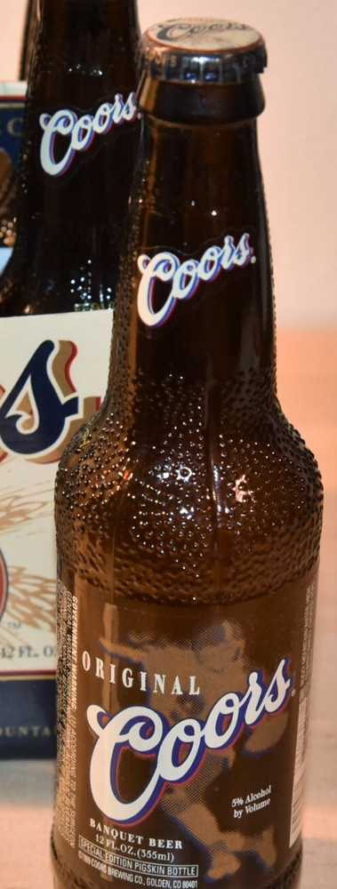 Coors PIGSKIN BOTTLE Single EMPTY with Top 1999