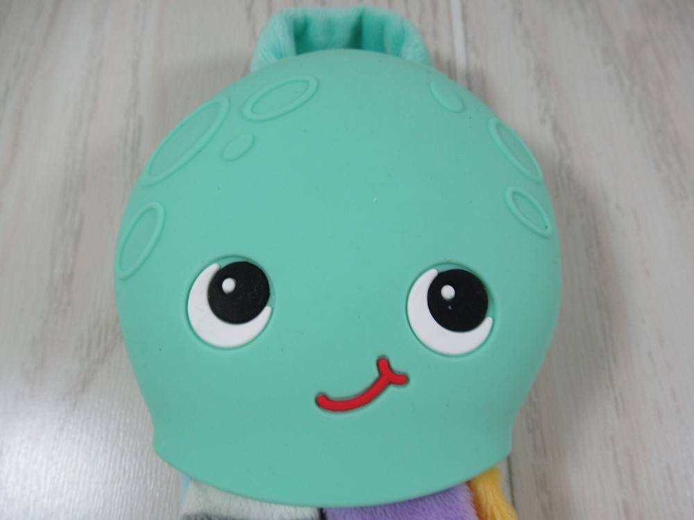 Silli Chews green octopus teether plush multi-colored legs tentacles gray stripe