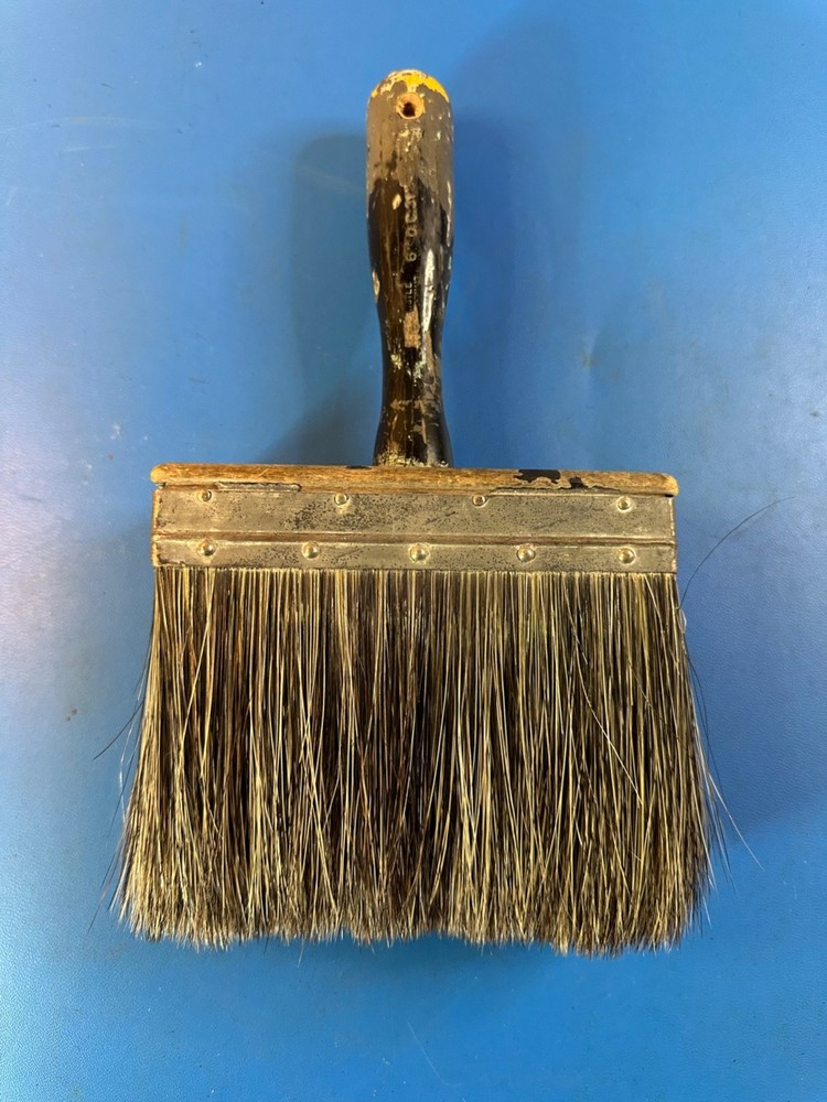 Large vintage plastering paint brush