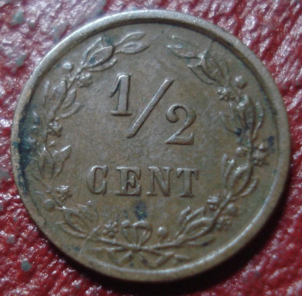 1885 NETHERLANDS 1/2 CENT IN FINE-VF CONDITION