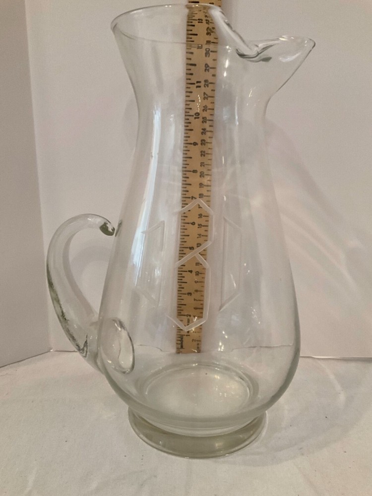 Clear Glass water pitcher etched BCD 12”