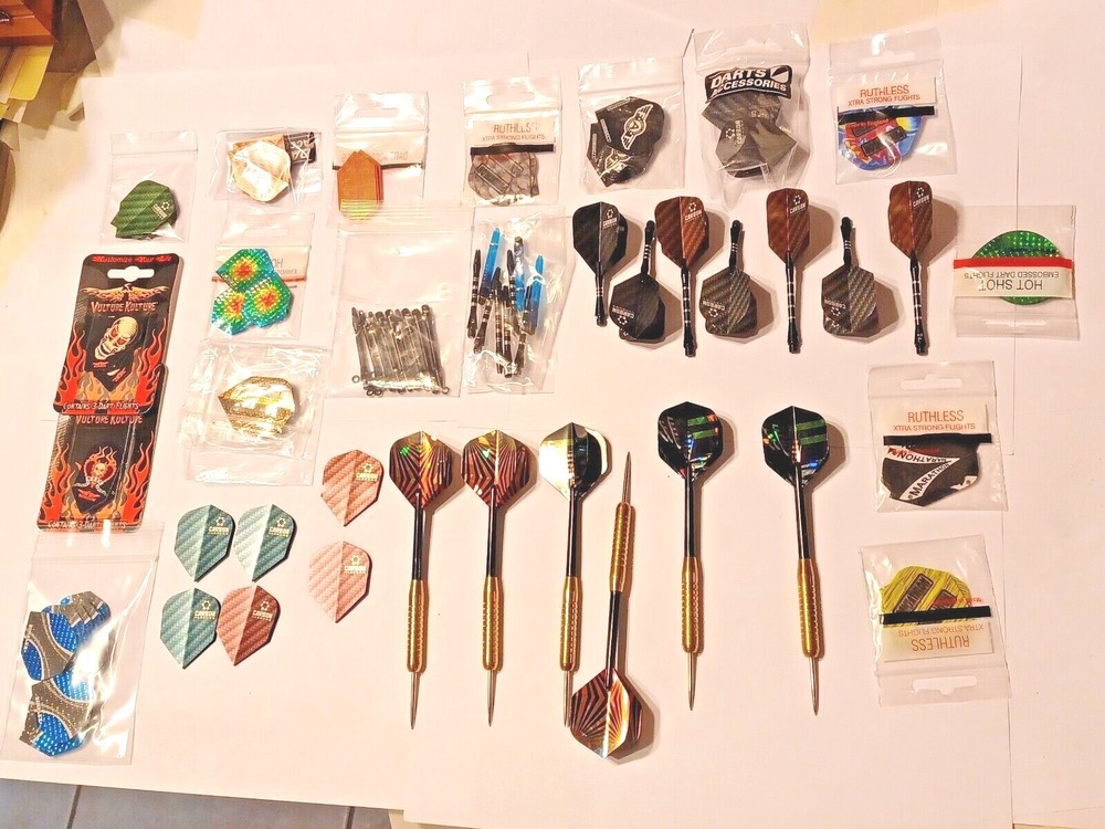 6 Darts And Accessories