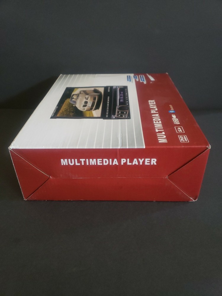 Auto multimedia player. New open box. 7" touch screen. See description