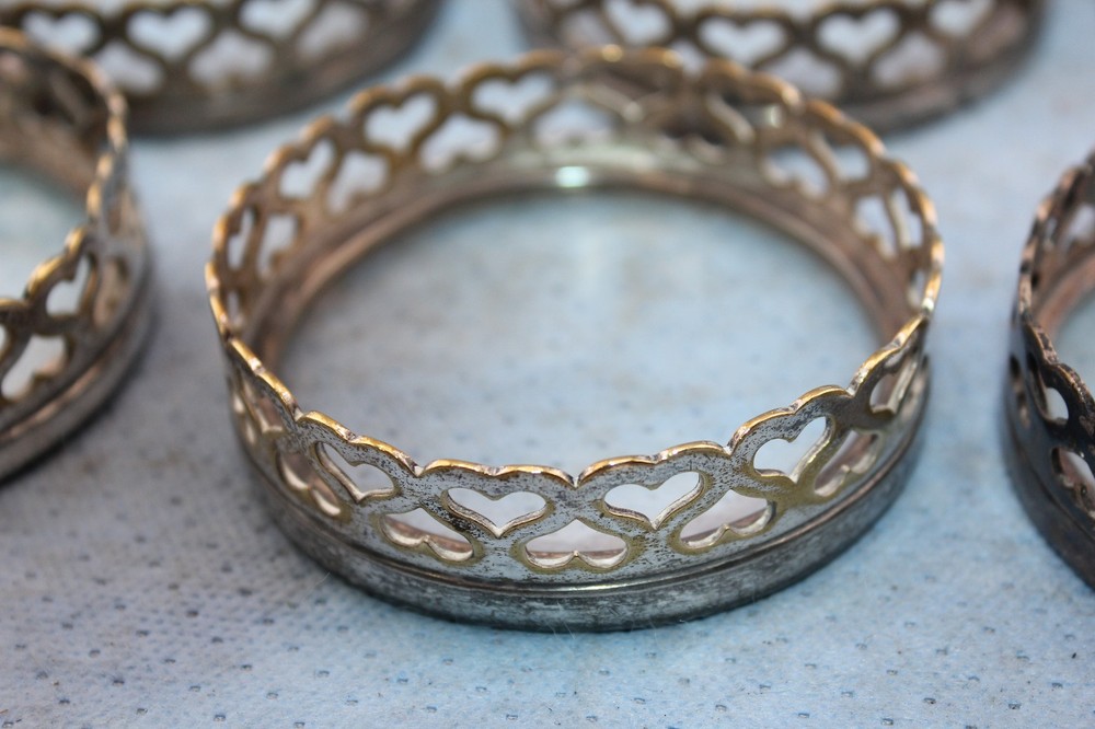 SEVEN VINTAGE SILVERPLATE COASTERS GLASS BOTTOMS HEART PATTERN