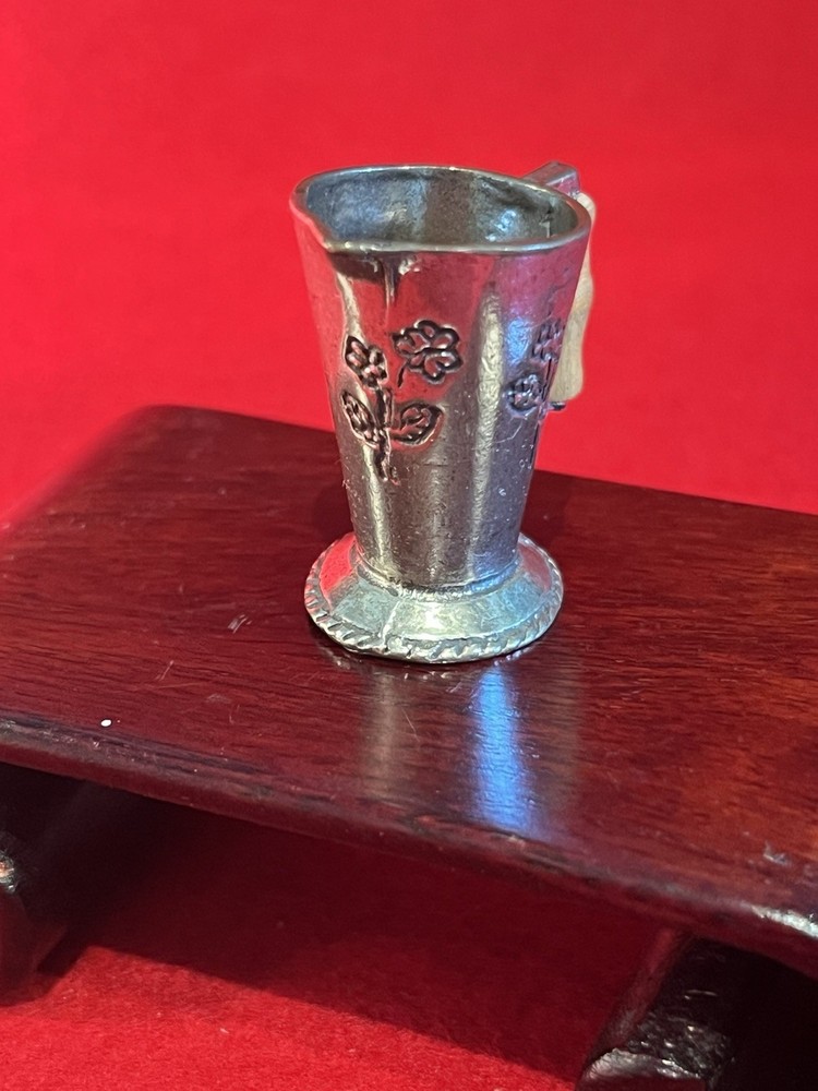silver miniature pitcher a/ wood handle marked "Blue Marine"