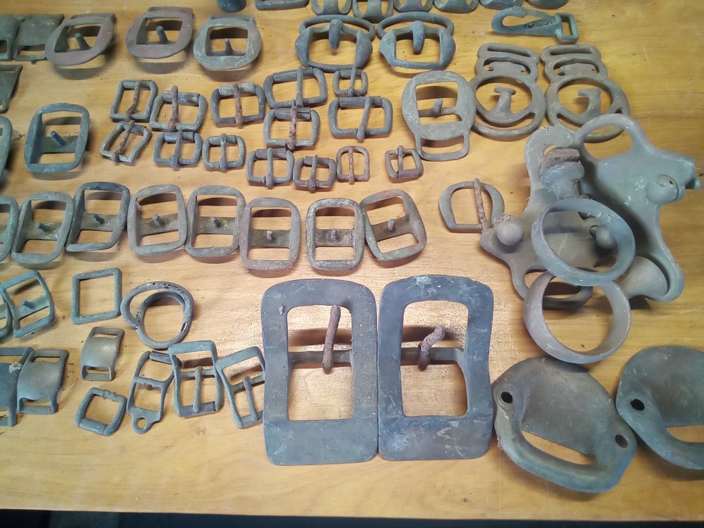 large assortment brass harness buckles