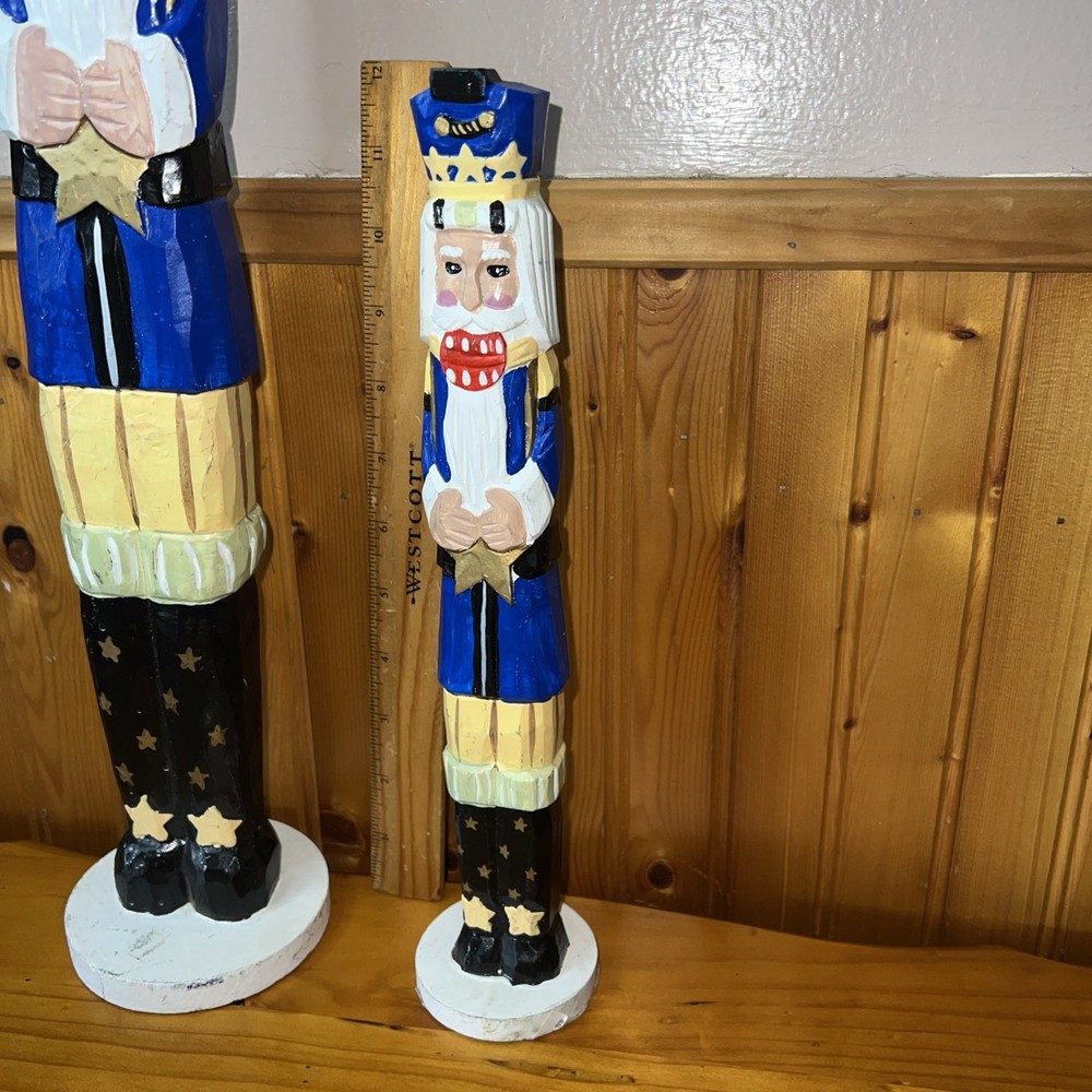 2 Tall decorative nutcracker figurines
