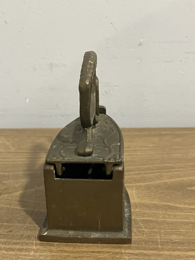 Vintage Embossed Brass Sad Iron