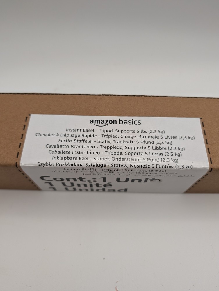 Amazon Basics Instant Adjustable Collapsible Tripod Easel.
