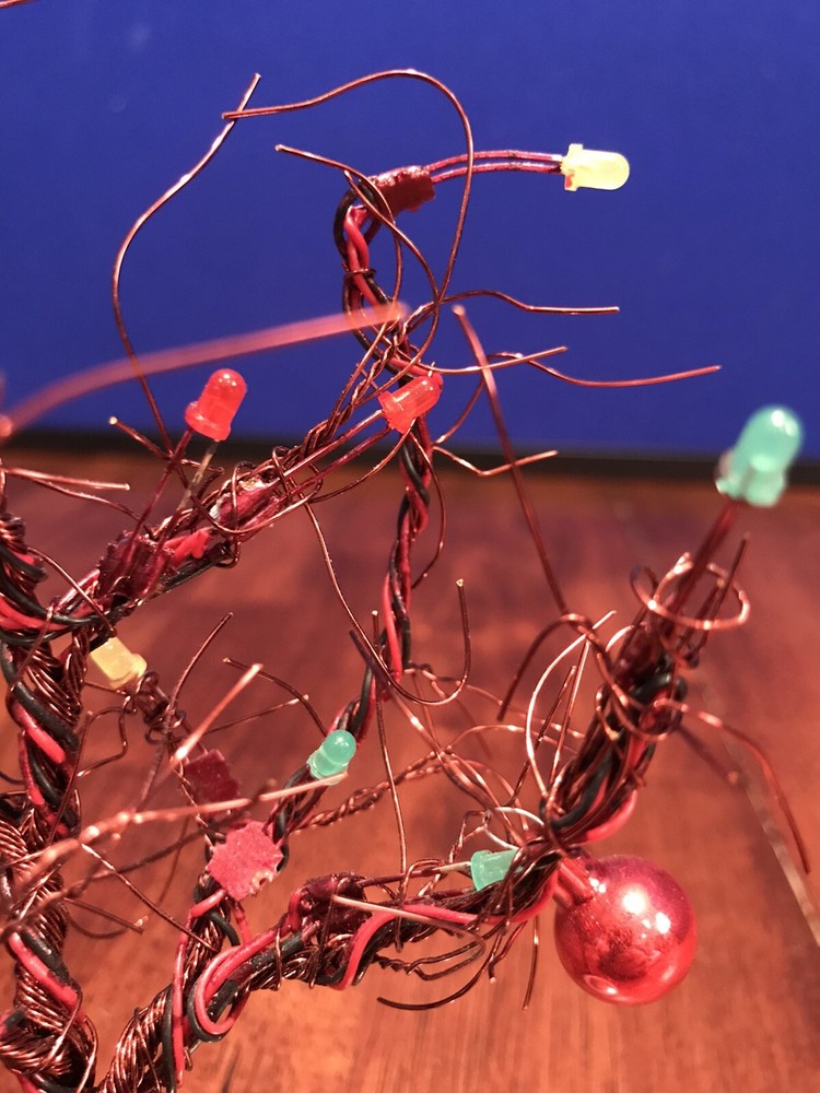 Twisted Red Wire Christmas Tree Plays Music