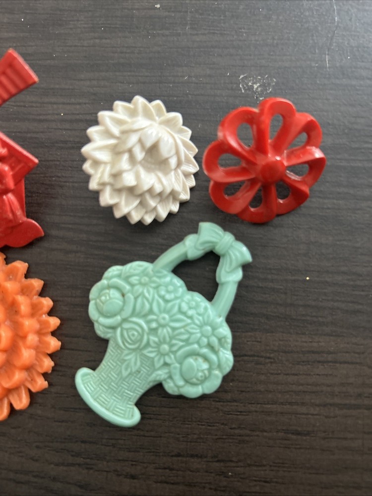 Celluloid Pin And Plastic Pieces Lot