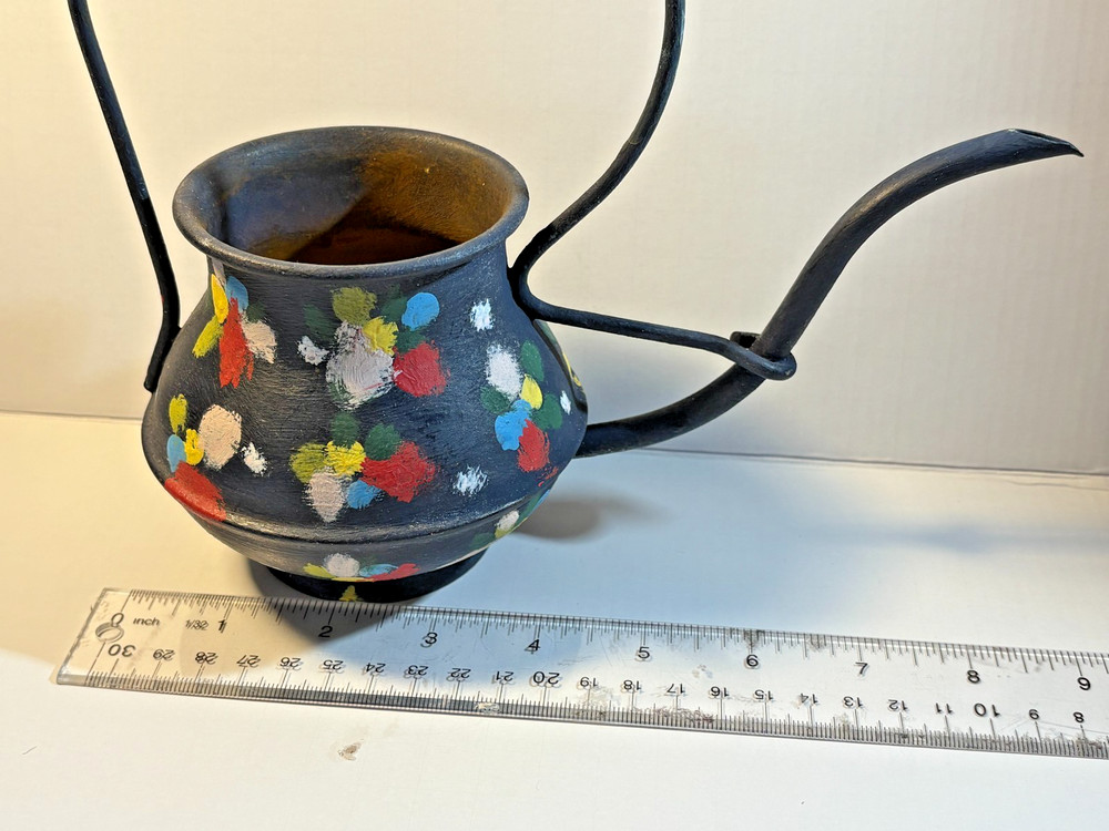 Hand painted decorative copper watering can. 8" tall. Light rust inside.