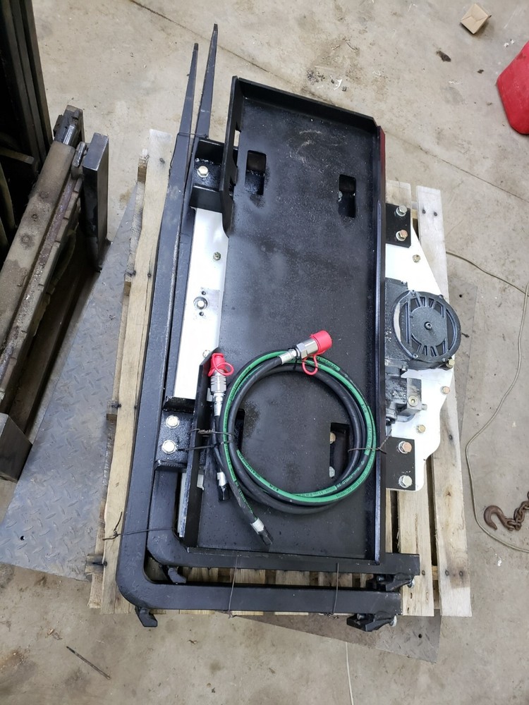 Skidsteer Bobcat fork rotator--- NEW WITH WARRANTY!!!