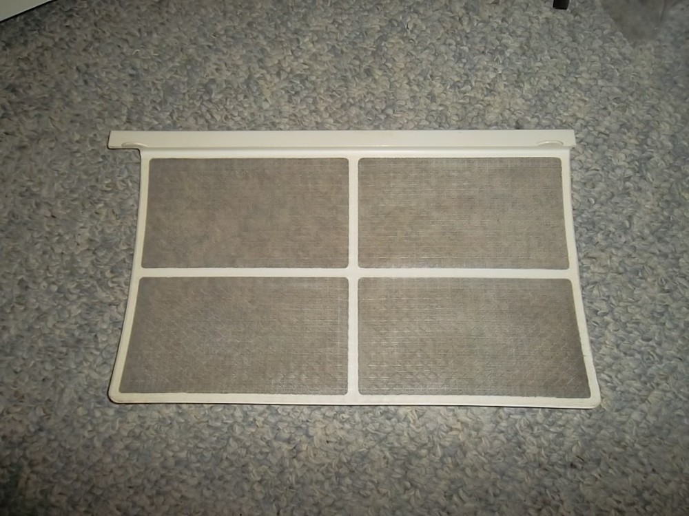 Fedders Ac model: A6X05F2A Front panel frame with Filter.